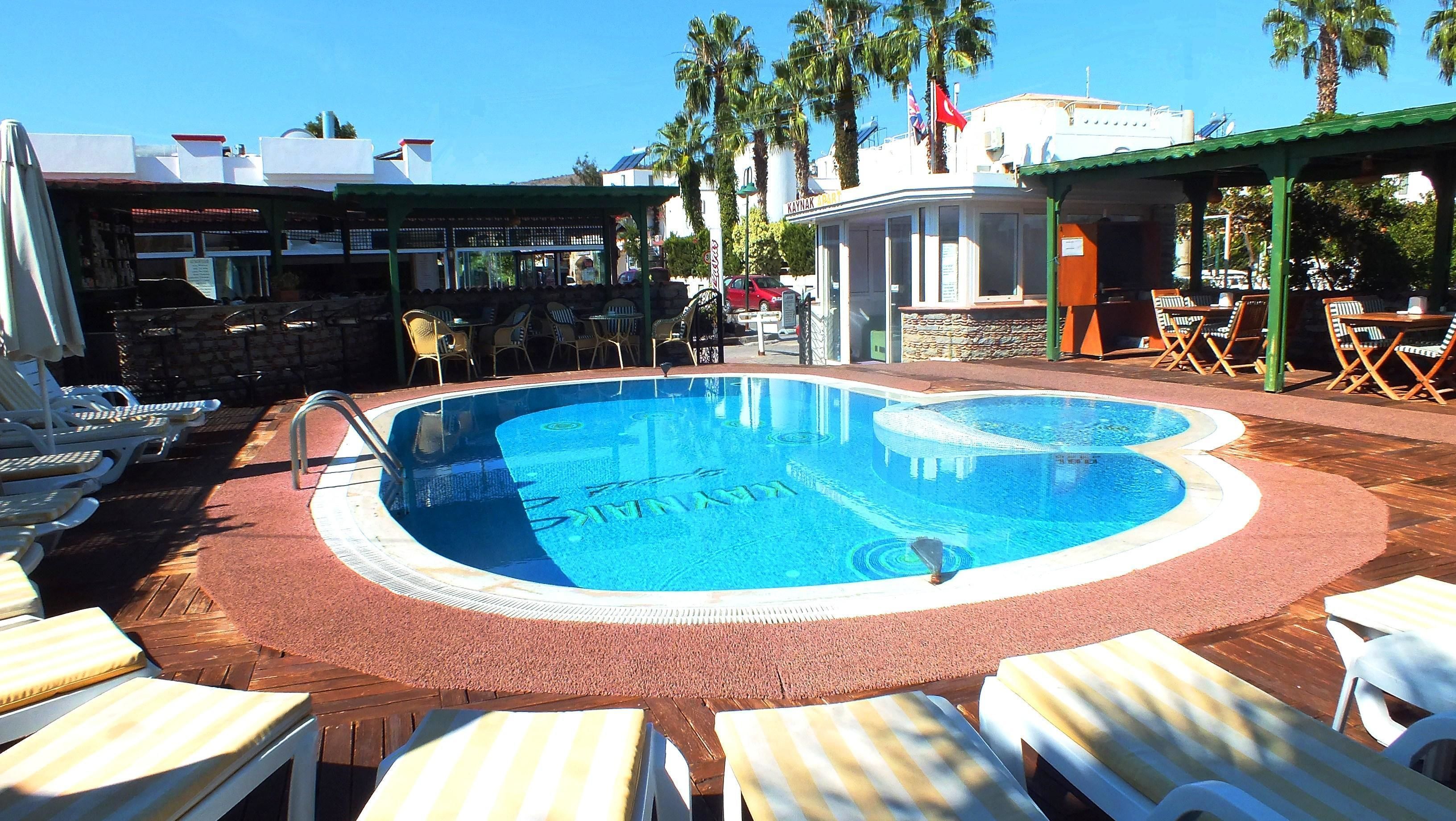 Outdoor pool, pool umbrellas, sun loungers