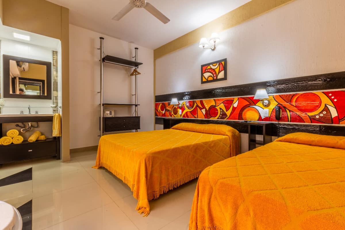 triple room | 1 bedroom, premium bedding, in-room safe, individually decorated