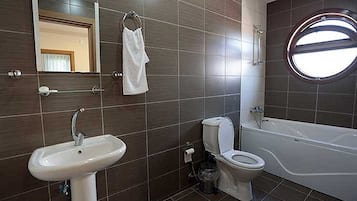 Bathtub, free toiletries, hair dryer, bathrobes