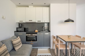 Standard Apartment, 1 Bedroom | Private kitchen | Full-size fridge, microwave, oven, stovetop - Aspasios Poblenou Apartments  (Barcelona)