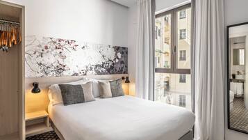 Apartamento superior, 3 habitaciones | Caja fuerte, cortinas opacas, tabla de planchar con plancha