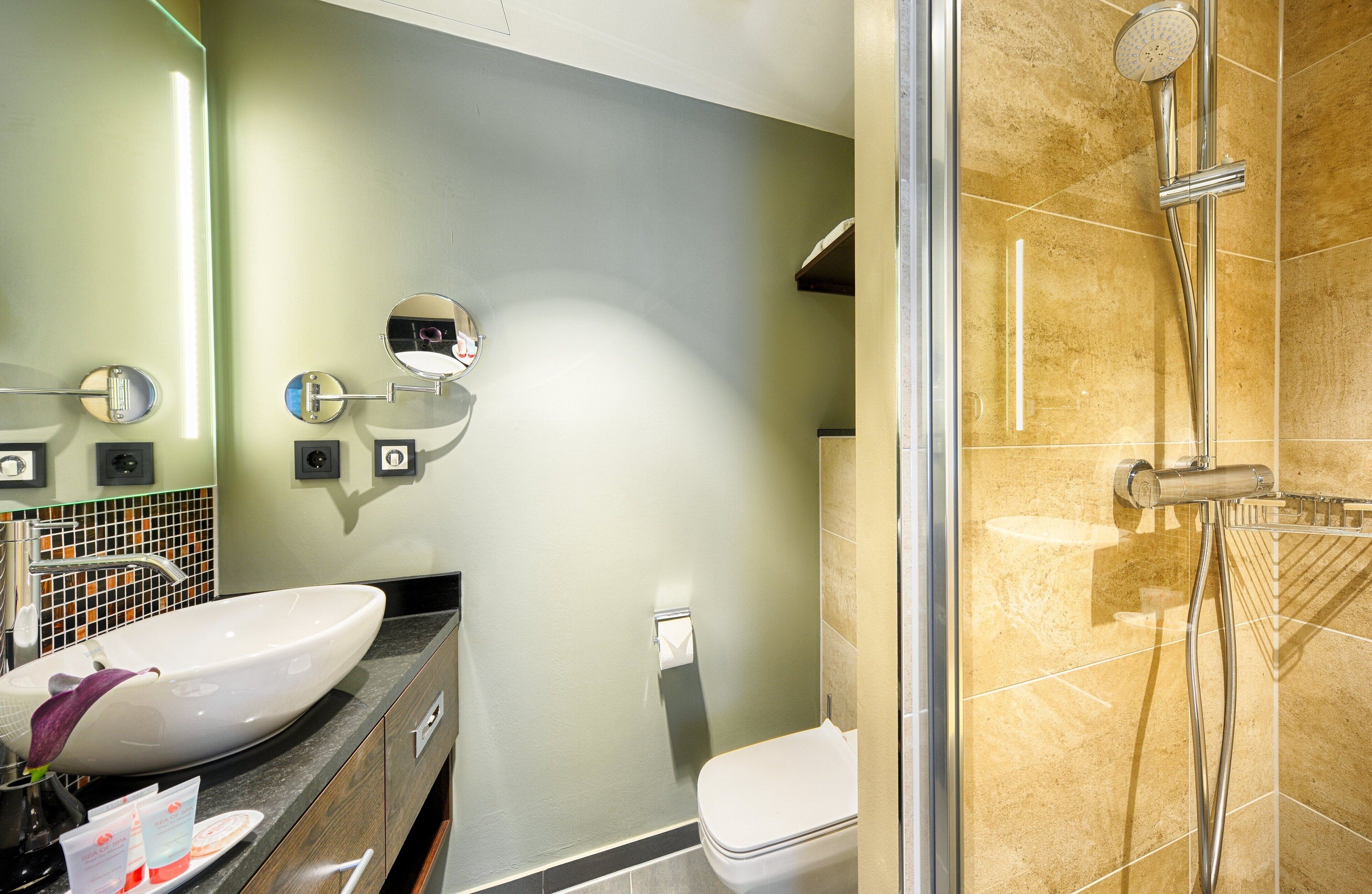 rainfall showerhead, designer toiletries, hair dryer, towels