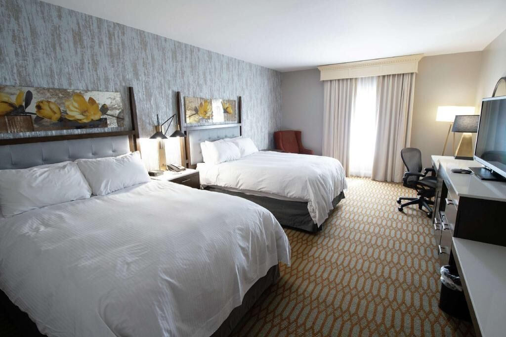 Hypo-allergenic bedding, down comforters, pillowtop beds, in-room safe