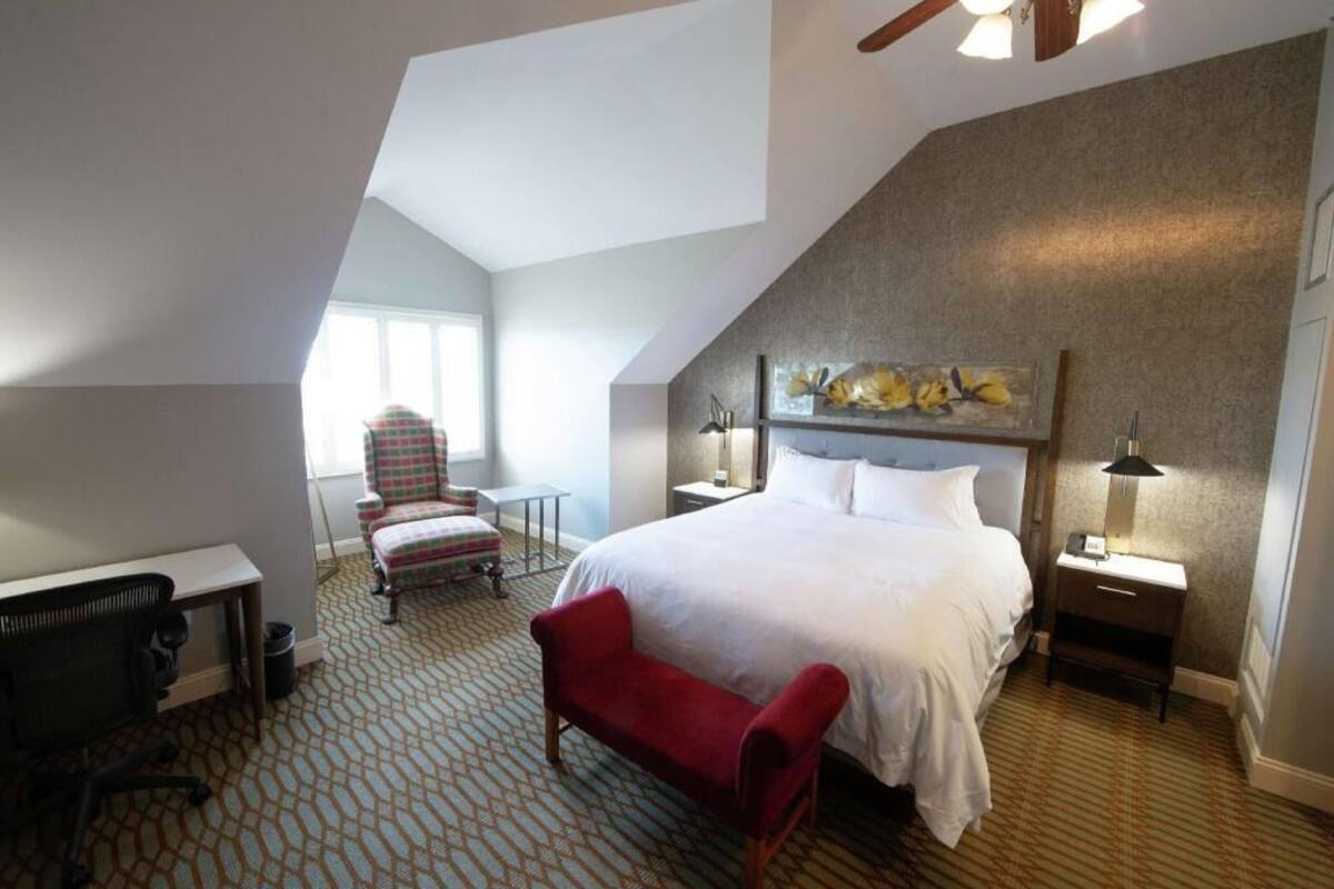 Hypo-allergenic bedding, down comforters, pillowtop beds, in-room safe