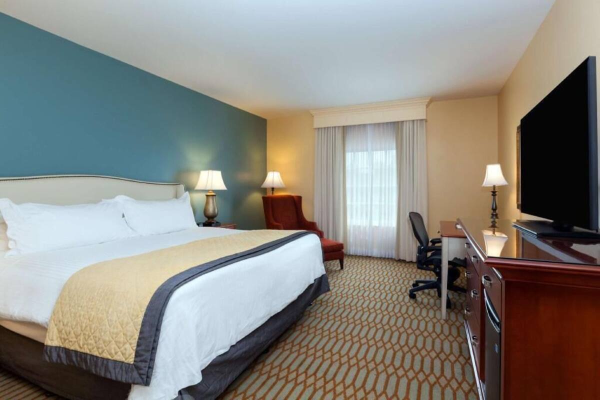 Hypo-allergenic bedding, down comforters, pillowtop beds, in-room safe