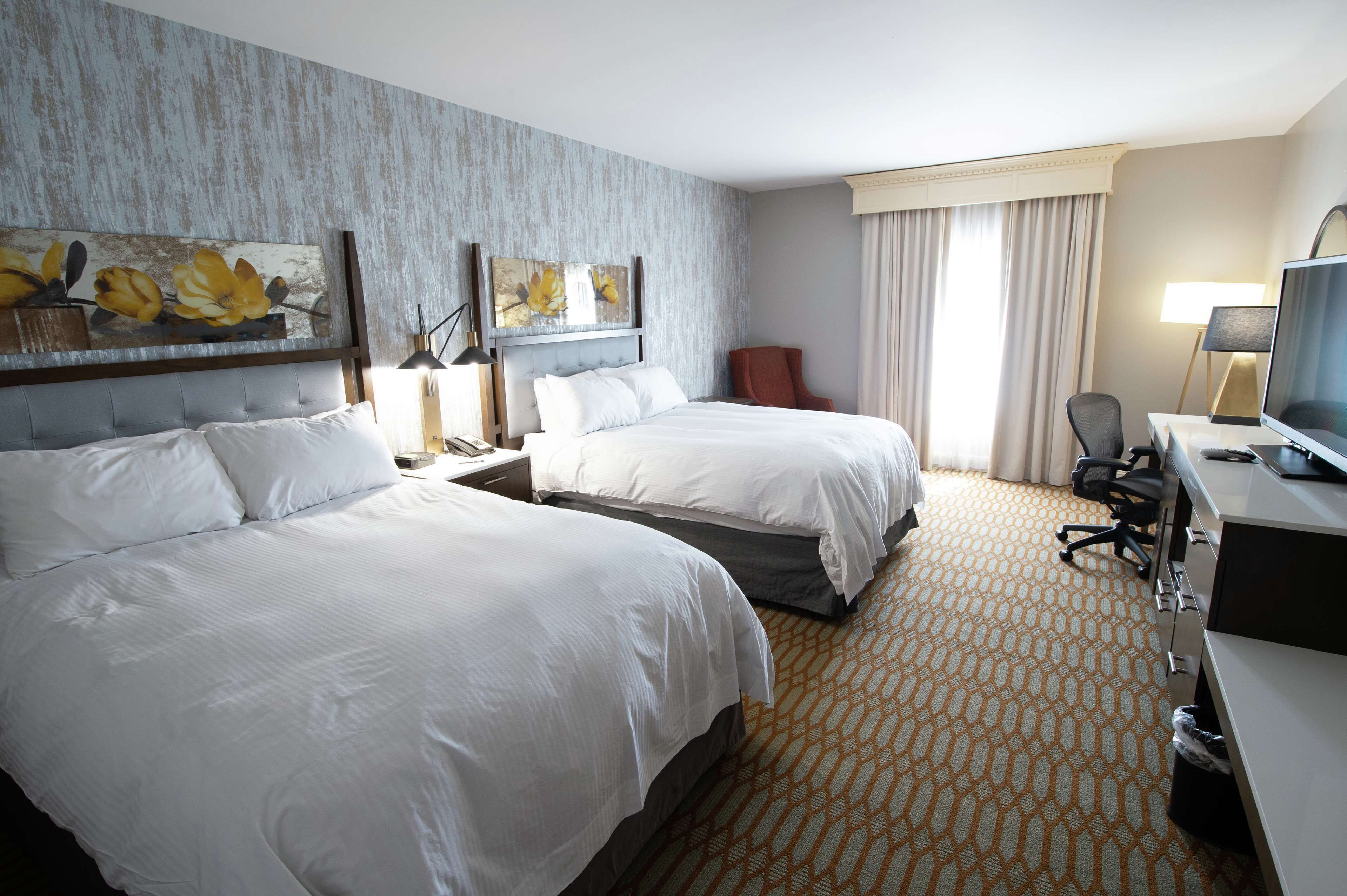 Hypo-allergenic bedding, down comforters, pillowtop beds, in-room safe
