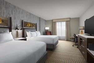 Hypo-allergenic bedding, down comforters, pillowtop beds, in-room safe