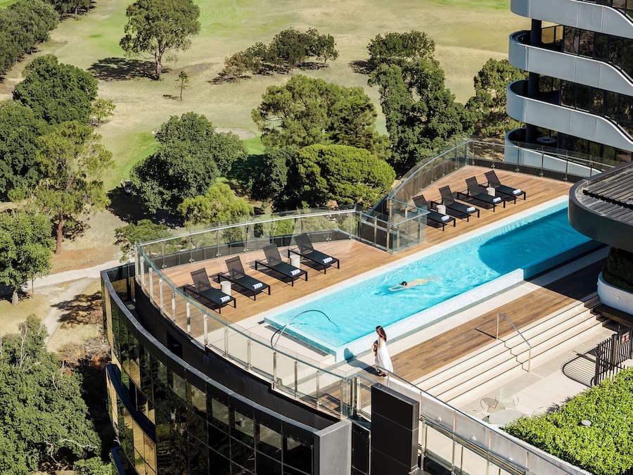 Outdoor pool, open 6 AM to 10 PM, sun loungers