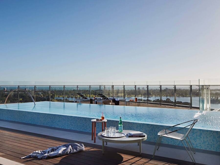 Outdoor pool, open 6 AM to 10 PM, sun loungers