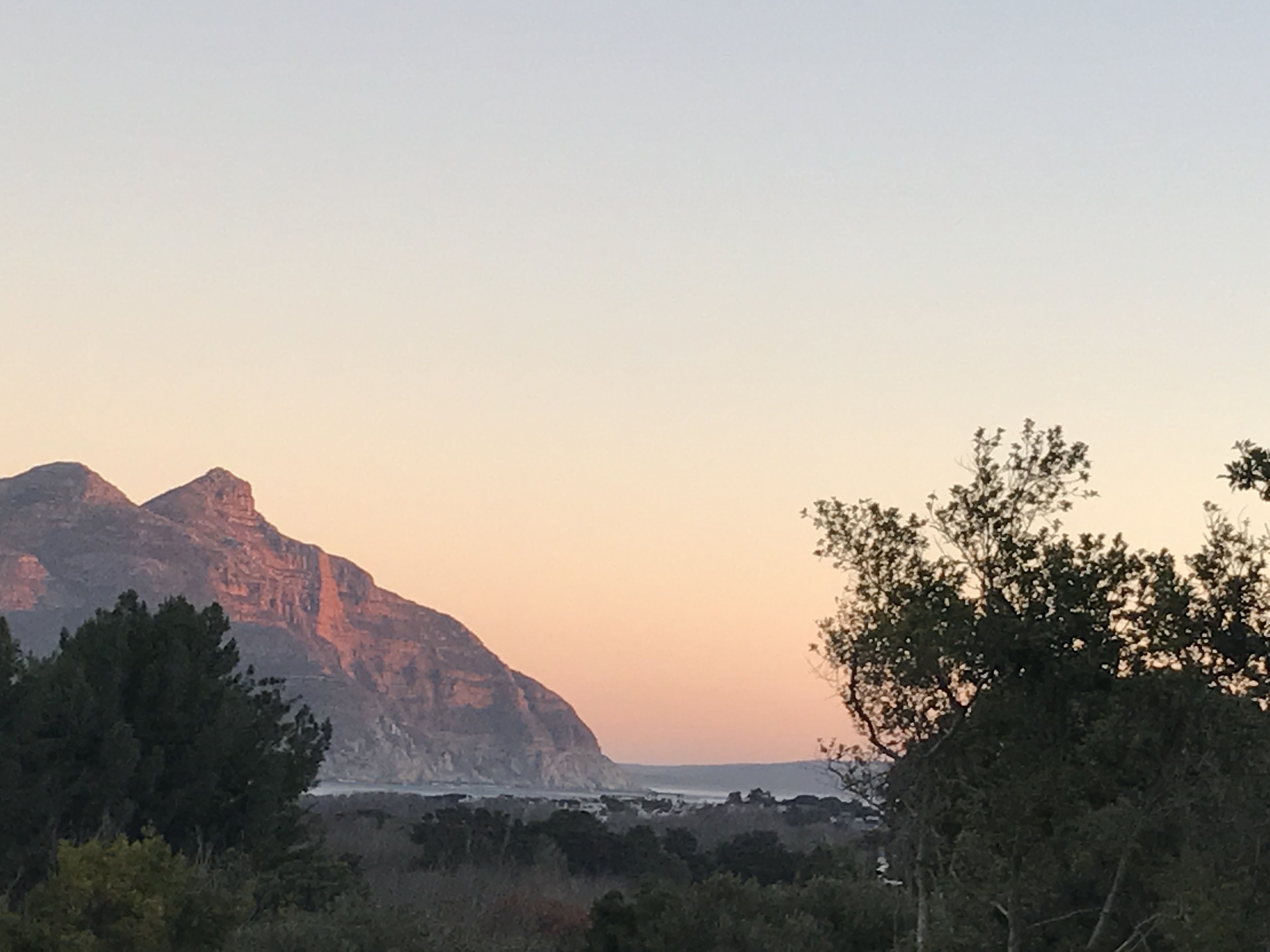 A mountainous landscape with a clear sky.