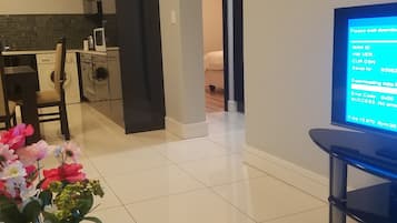 Apartment, 2 Bedrooms | Living area | Flat-screen TV