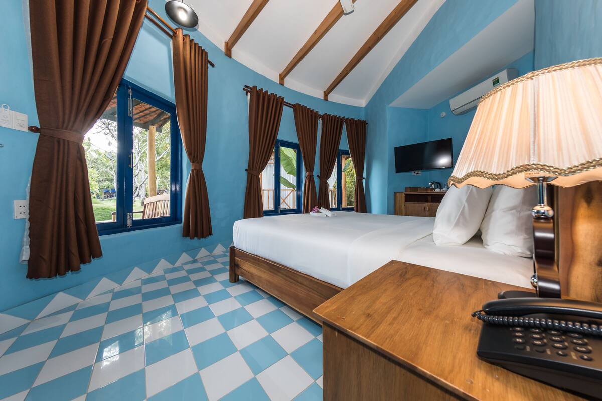 Bungalow dành cho gia đình, 2 phòng ngủ, quang cảnh vườn (Double) | Minibar, két bảo mật tại phòng, bàn, màn/rèm cản sáng 