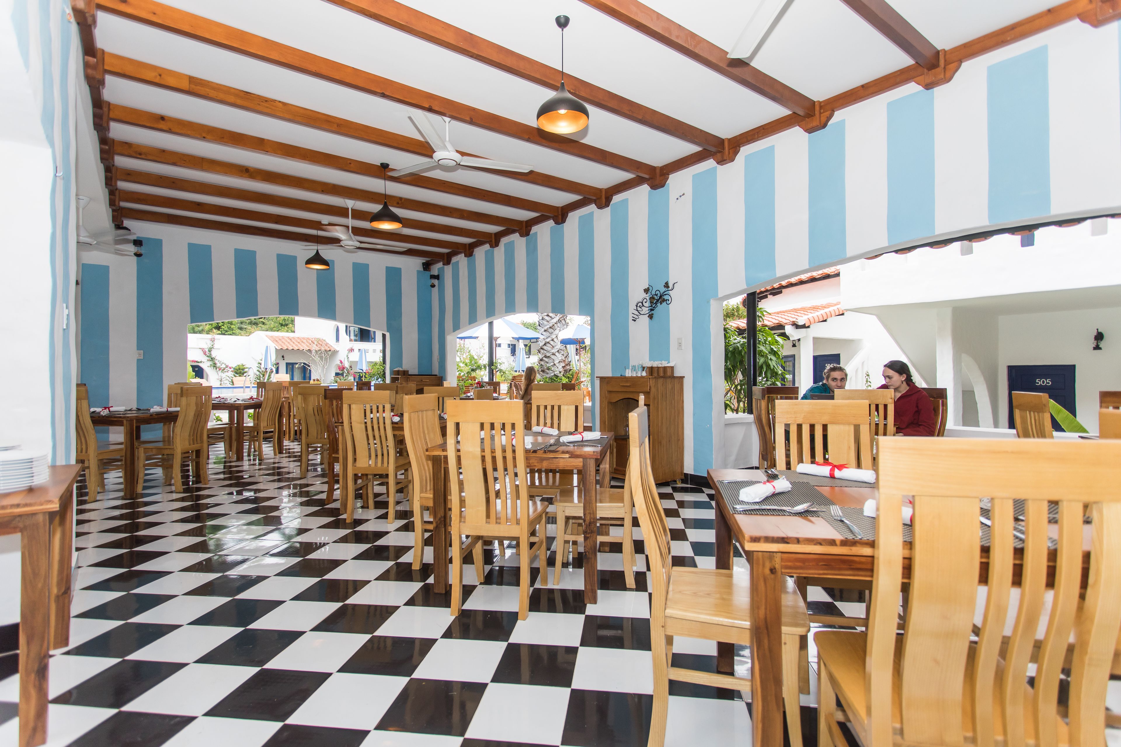 breakfast, lunch served; local and international cuisine, pool views