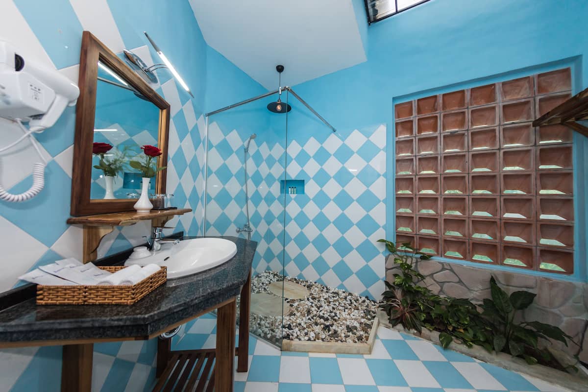 premier bungalow double | bathroom | shower, free toiletries, hair dryer, slippers