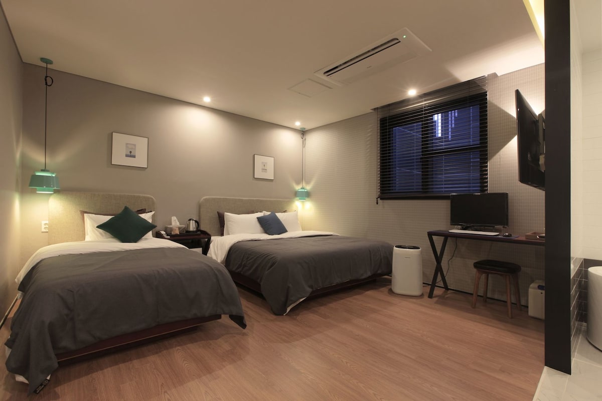 Premium bedding, down comforters, desk, soundproofing