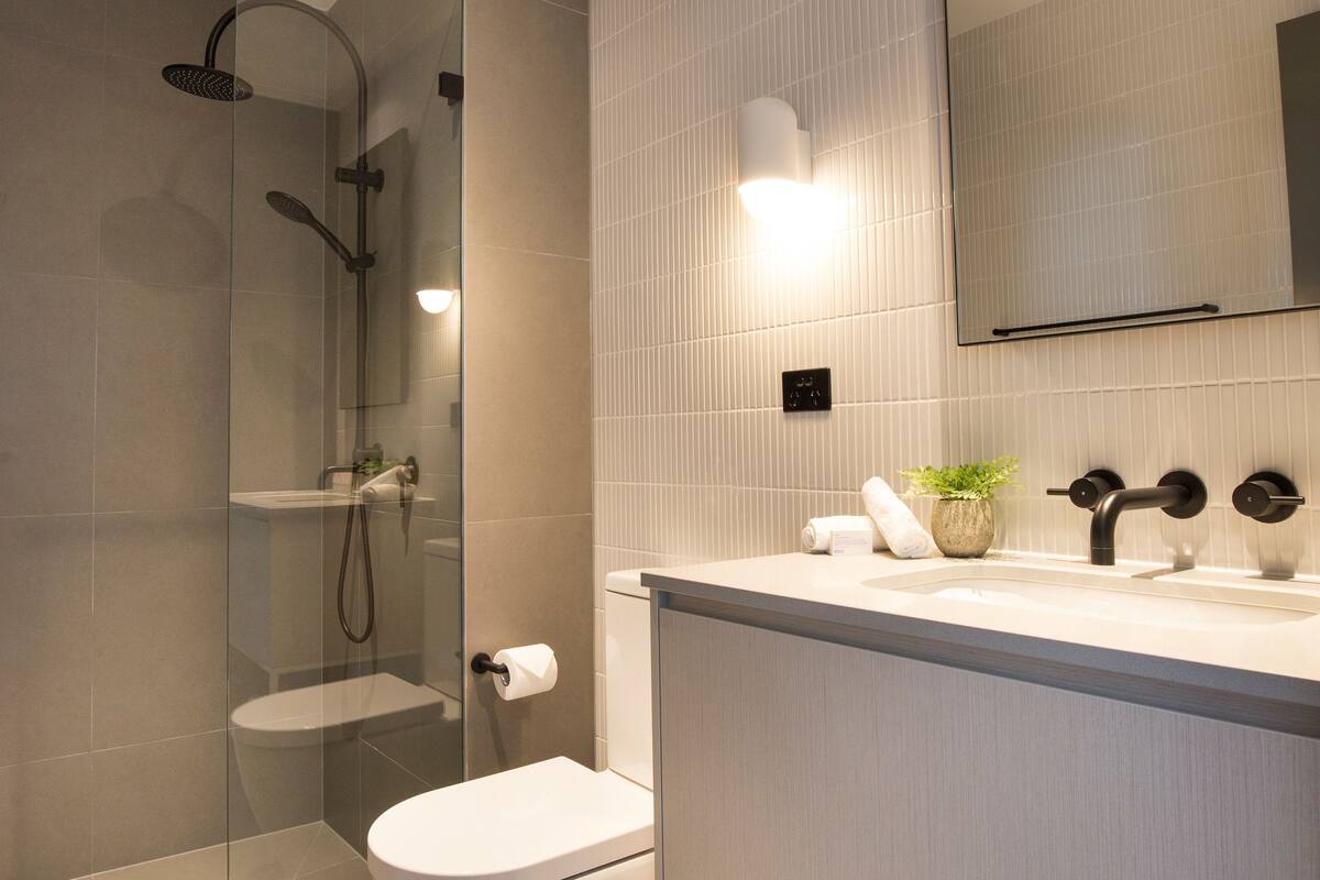 shower, designer toiletries, hair dryer, bathrobes