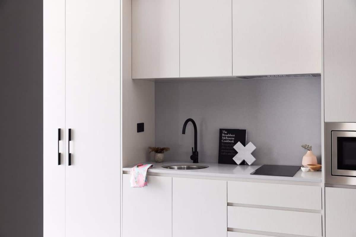 fridge, electric kettle, cookware/dishes/utensils