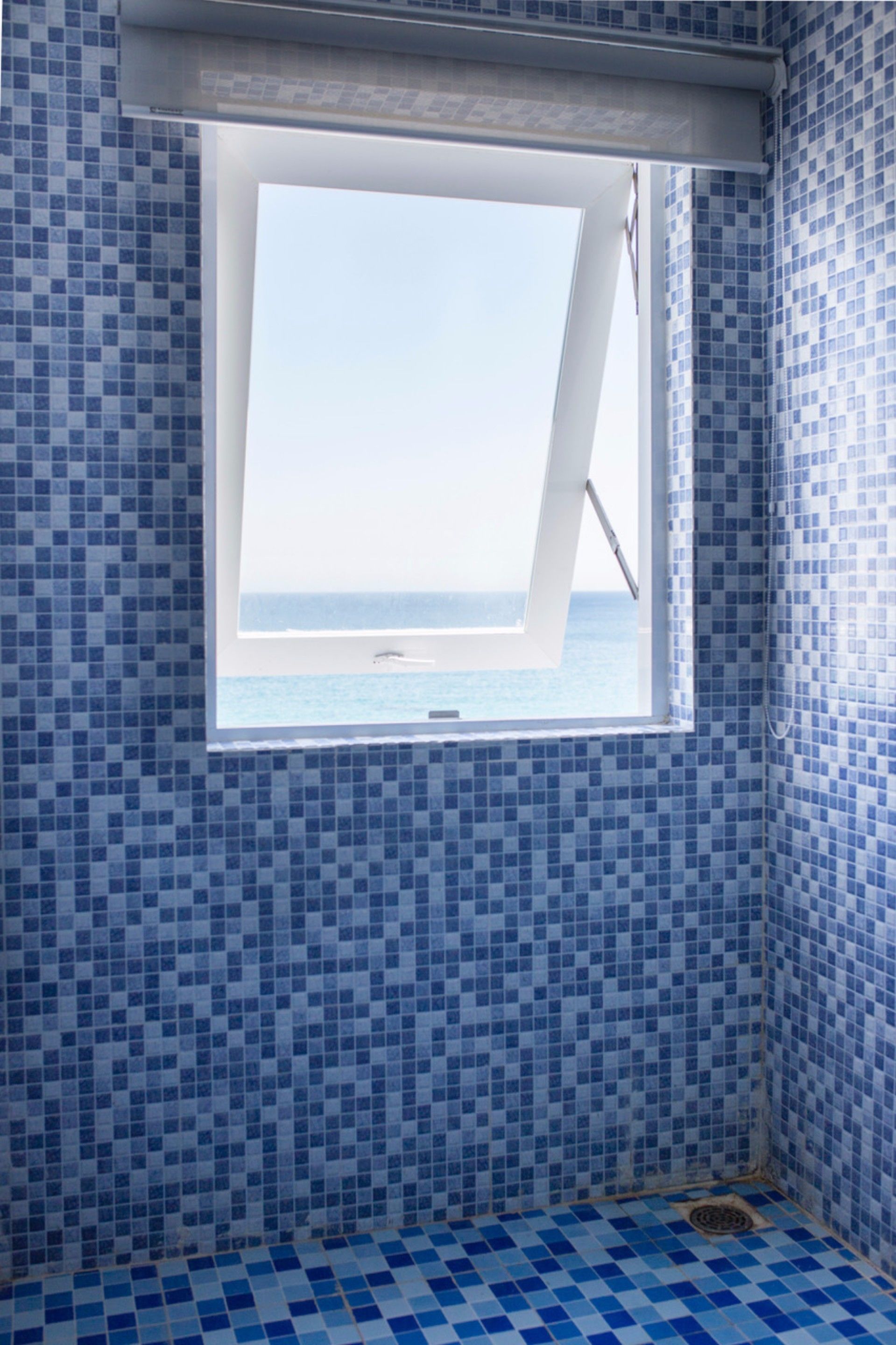 Shower, free toiletries, hair dryer, slippers
