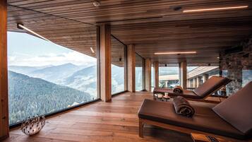 Massages aux pierres chaudes, massages sportifs, 1 salle de soins