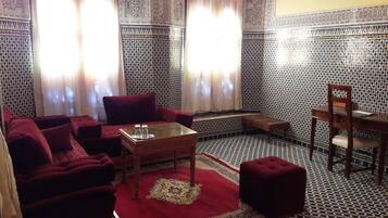 Senior Suite | Living area | Flat-screen TV