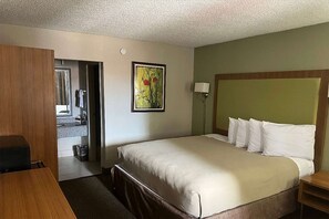 Premium bedding, pillow-top beds, desk, laptop workspace
