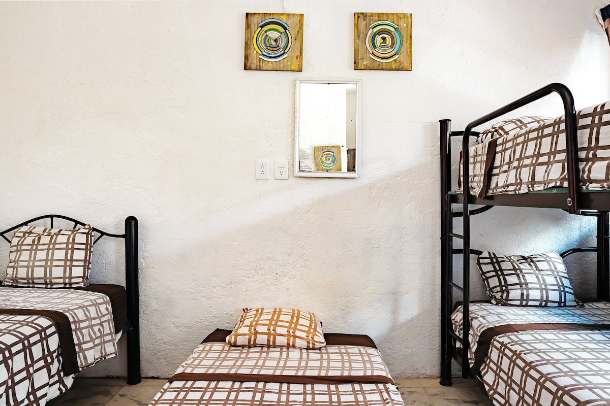 Standard Room, Multiple Beds, Garden View (Fan) | Blackout drapes, free WiFi, bed sheets