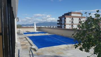 Alberca al aire libre y alberca en la azotea