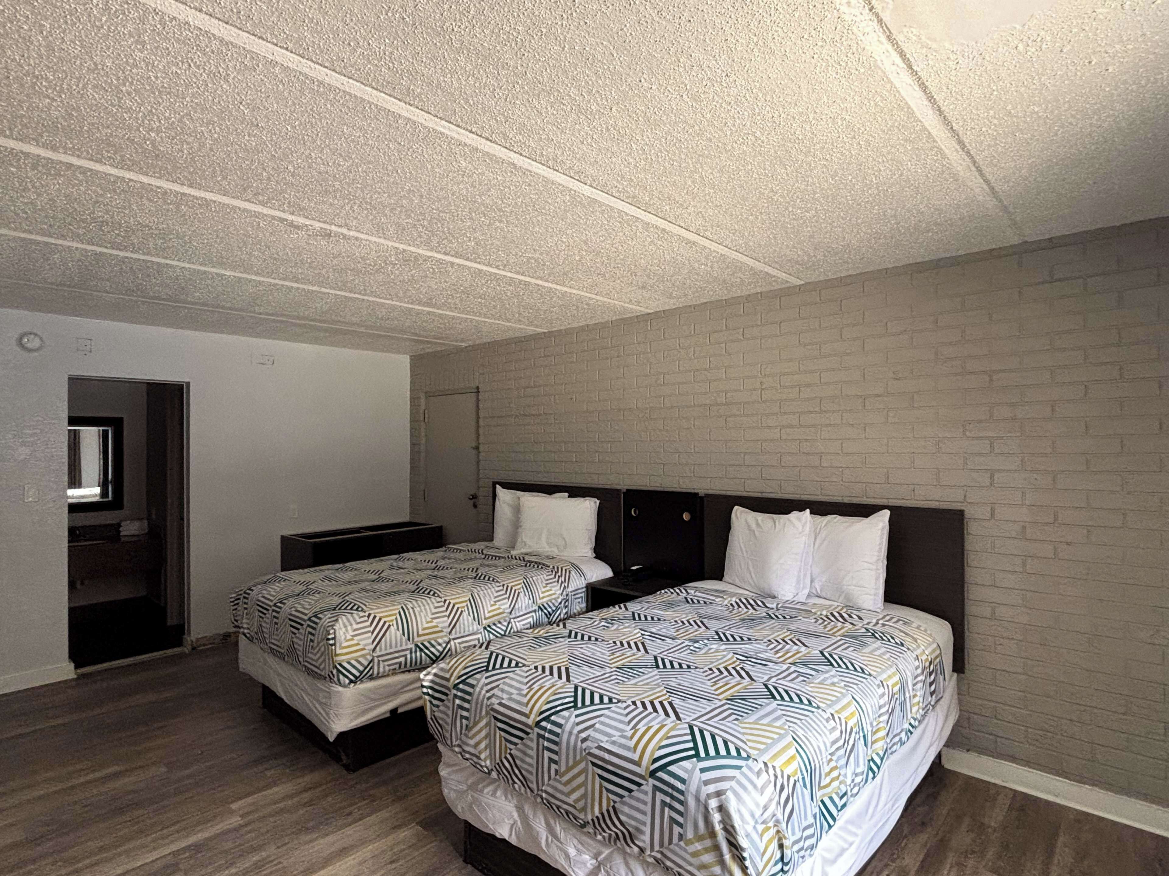 Desk, blackout drapes, soundproofing, iron/ironing board