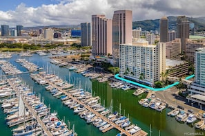 Stunning marina views surround this waterfront property, offering a tranquil escape amidst the city's vibrant atmosphere.