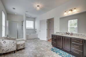 Combined shower/tub, hair dryer, towels, soap