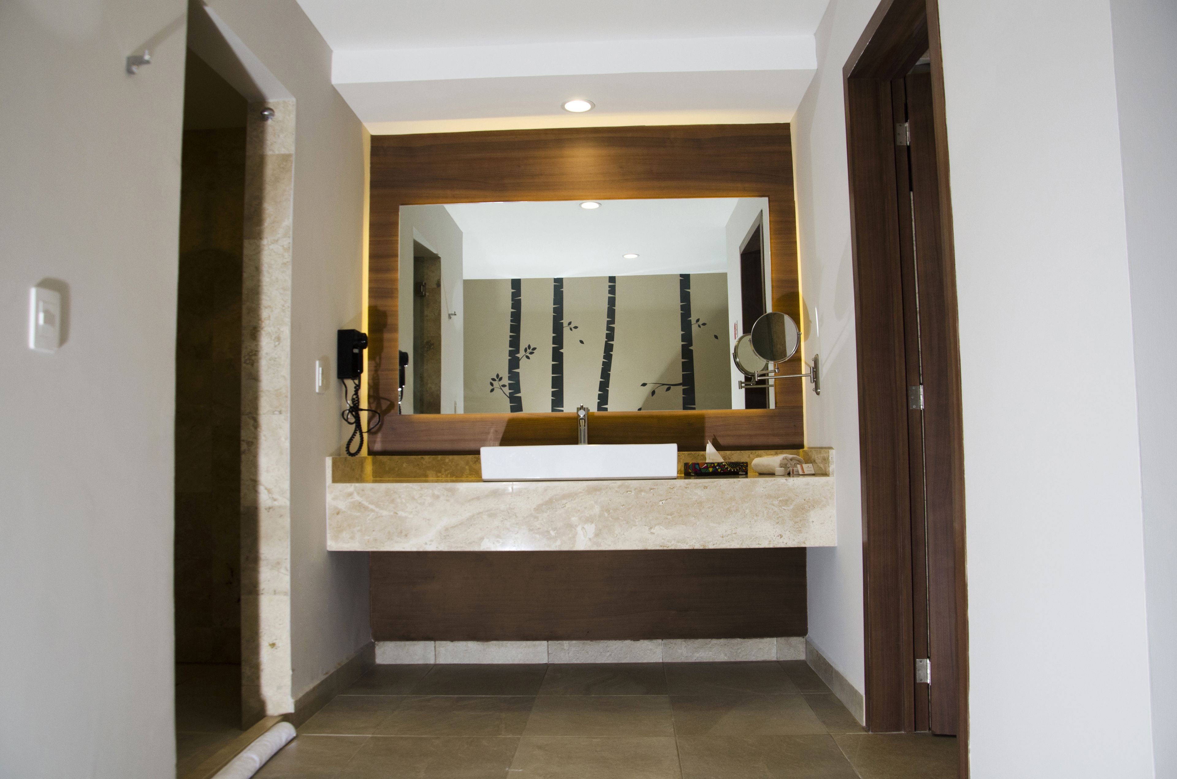 deluxe double room | bathroom | rainfall showerhead, free toiletries, hair dryer, towels