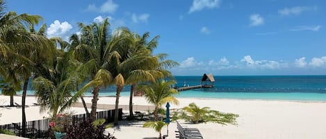 On the beach, sun-loungers, beach towels