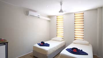 Premium bedding, in-room safe, iron/ironing board, bed sheets