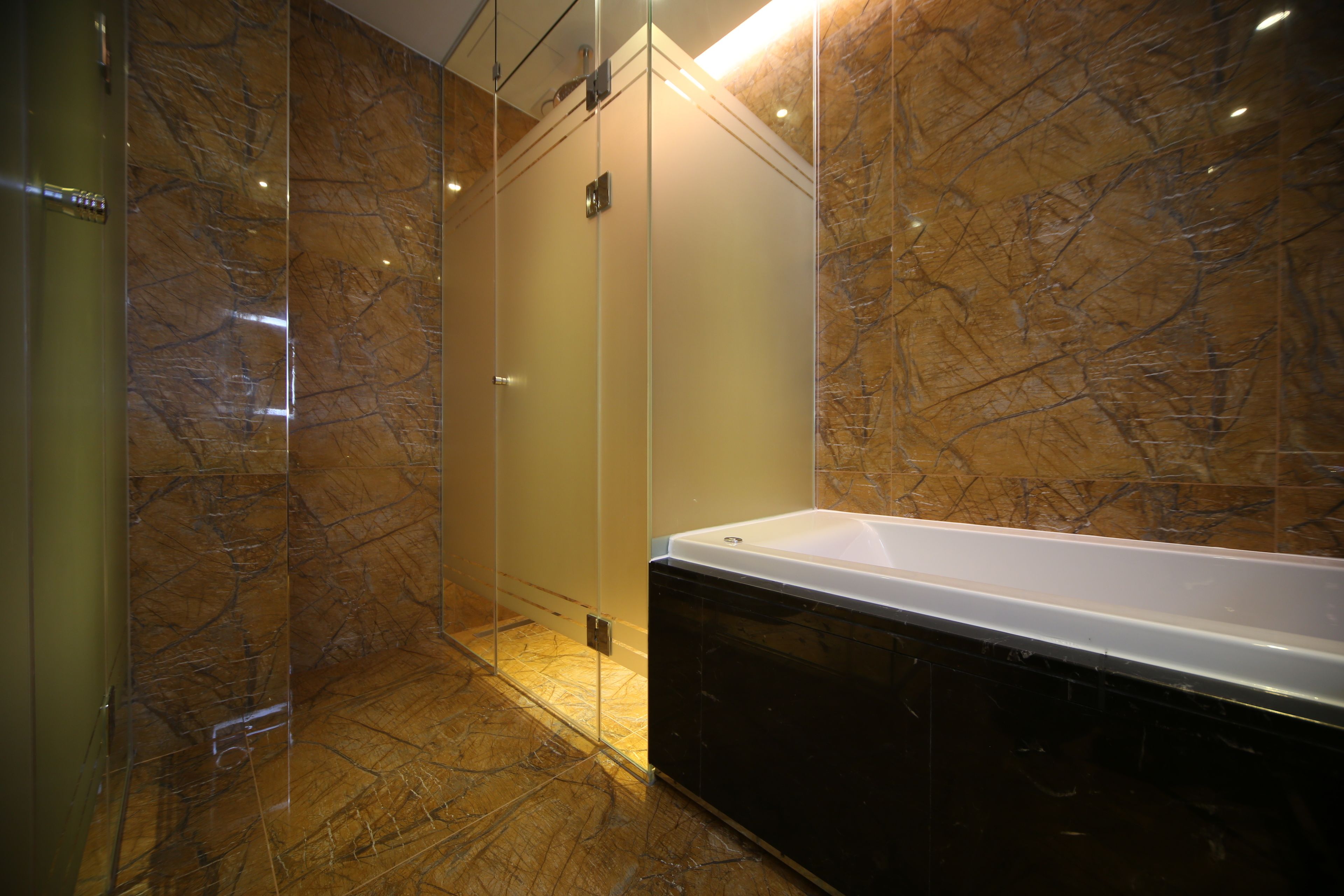 twin room | bathroom | separate bathtub and shower, designer toiletries, hair dryer, bathrobes