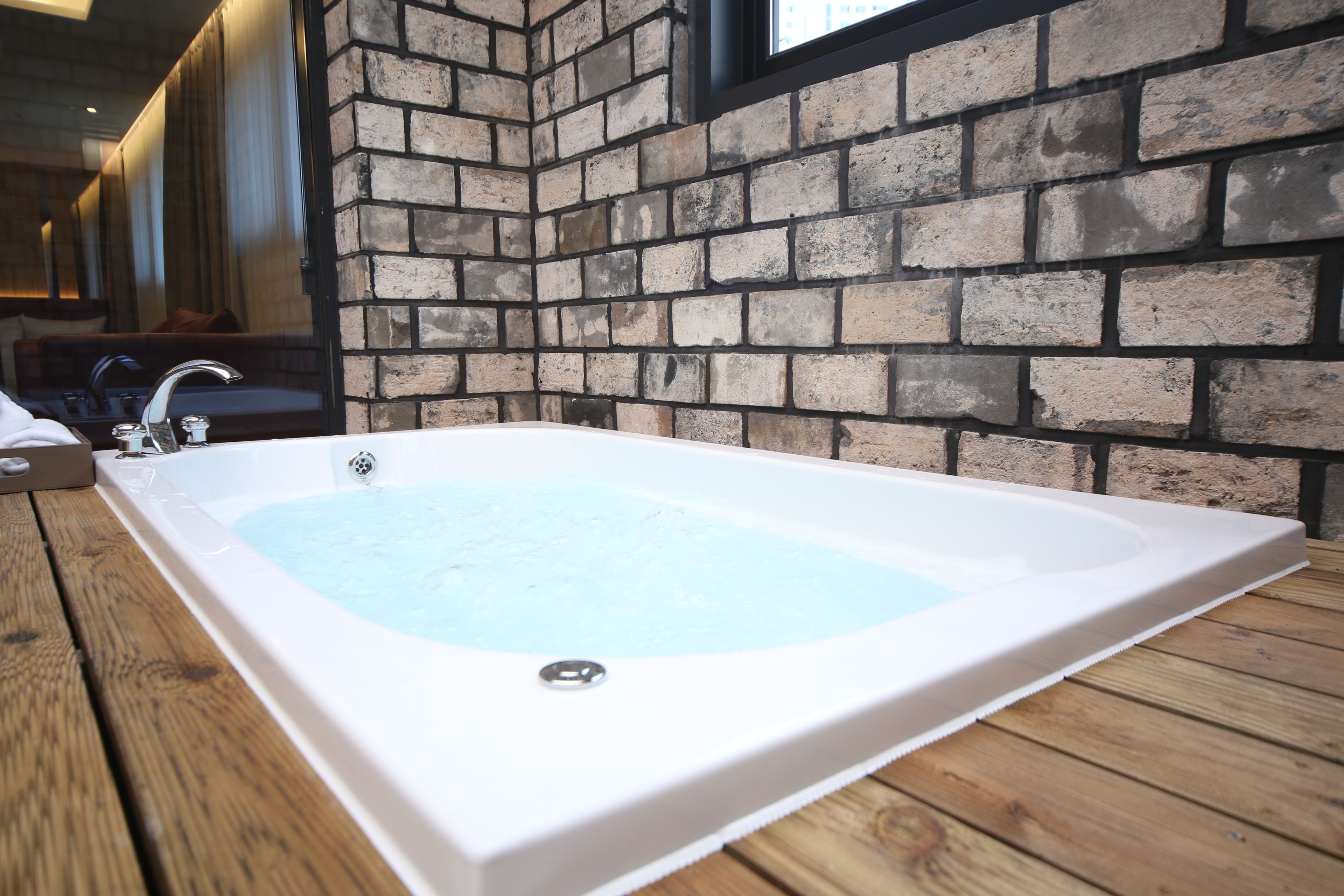 separate bathtub and shower, designer toiletries, hair dryer, bathrobes