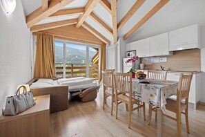 Superior Apartment, 2 Bedrooms, Balcony (6 pax) | Living area | Flat-screen TV