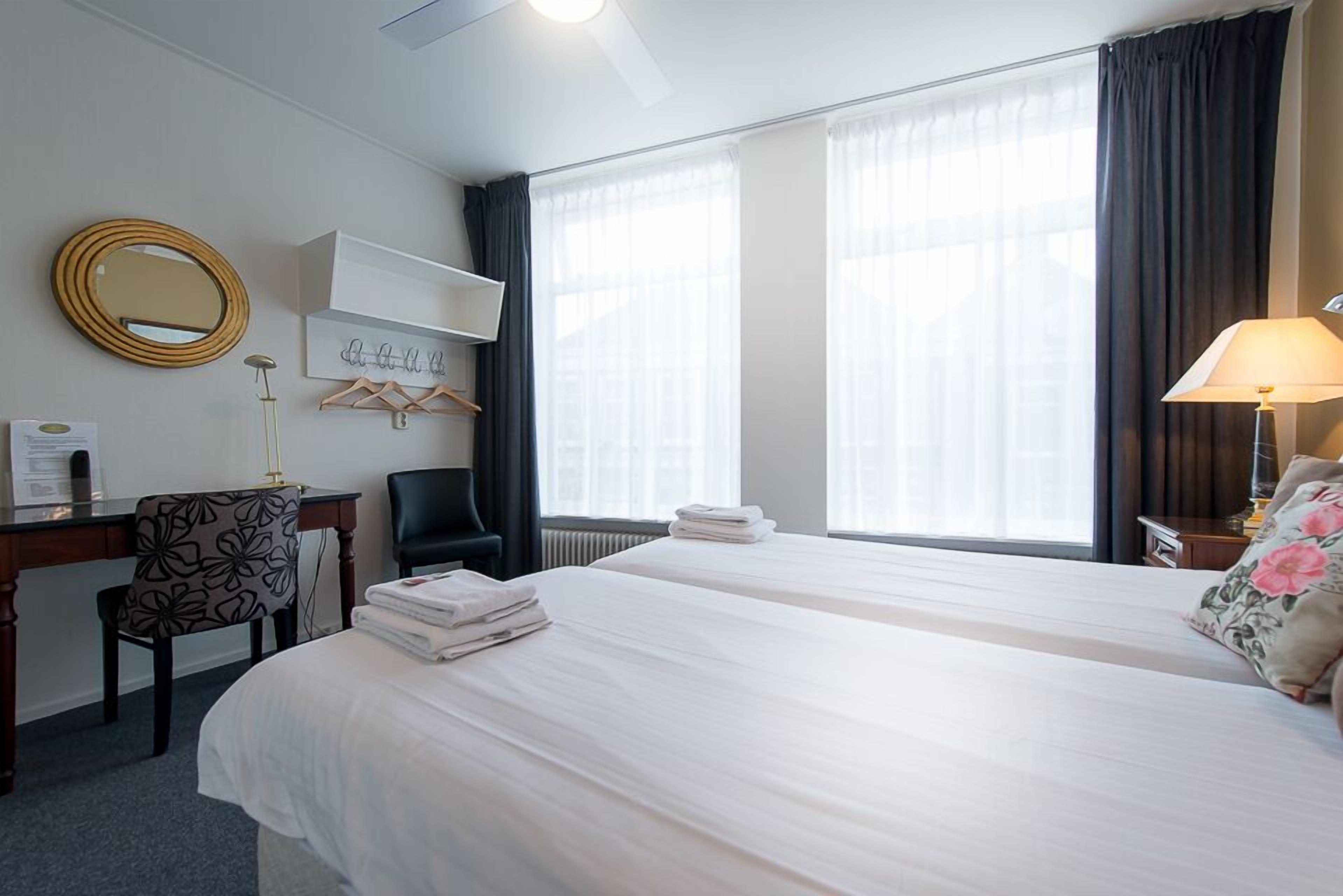 double room, 2 single beds | iron/ironing board, cots/infant beds, rollaway beds, free wifi