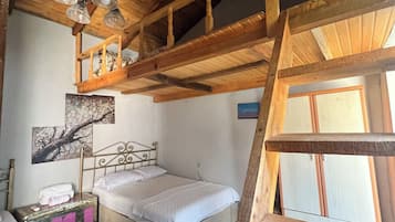 Family Quadruple Room, 4 Bedrooms, Private Bathroom, Garden Area | In-room safe, free WiFi