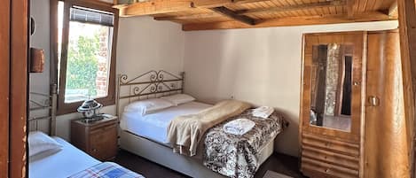 Family Quadruple Room, 4 Bedrooms, Private Bathroom, Garden Area | In-room safe, free WiFi