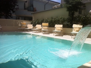 Outdoor pool, pool loungers