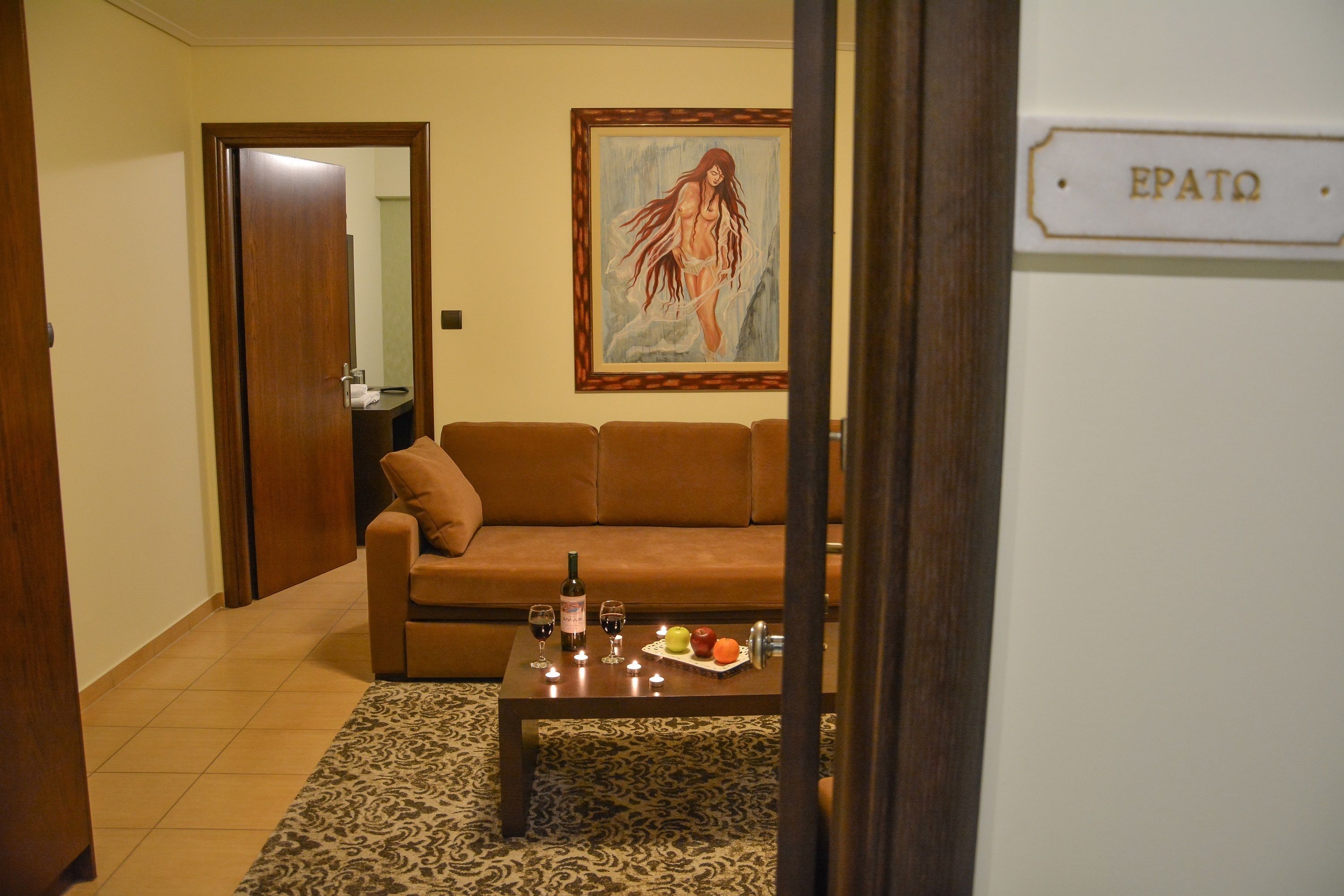 suite (erato) | living area | flat-screen tv