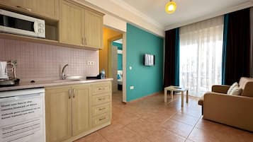 Fridge, microwave, stovetop, electric kettle