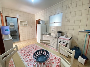 Standard Apartment | Private kitchen | Fridge, microwave, oven, dining tables