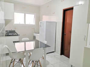 Superior Apartment | Private kitchen | Fridge, microwave, oven, dining tables