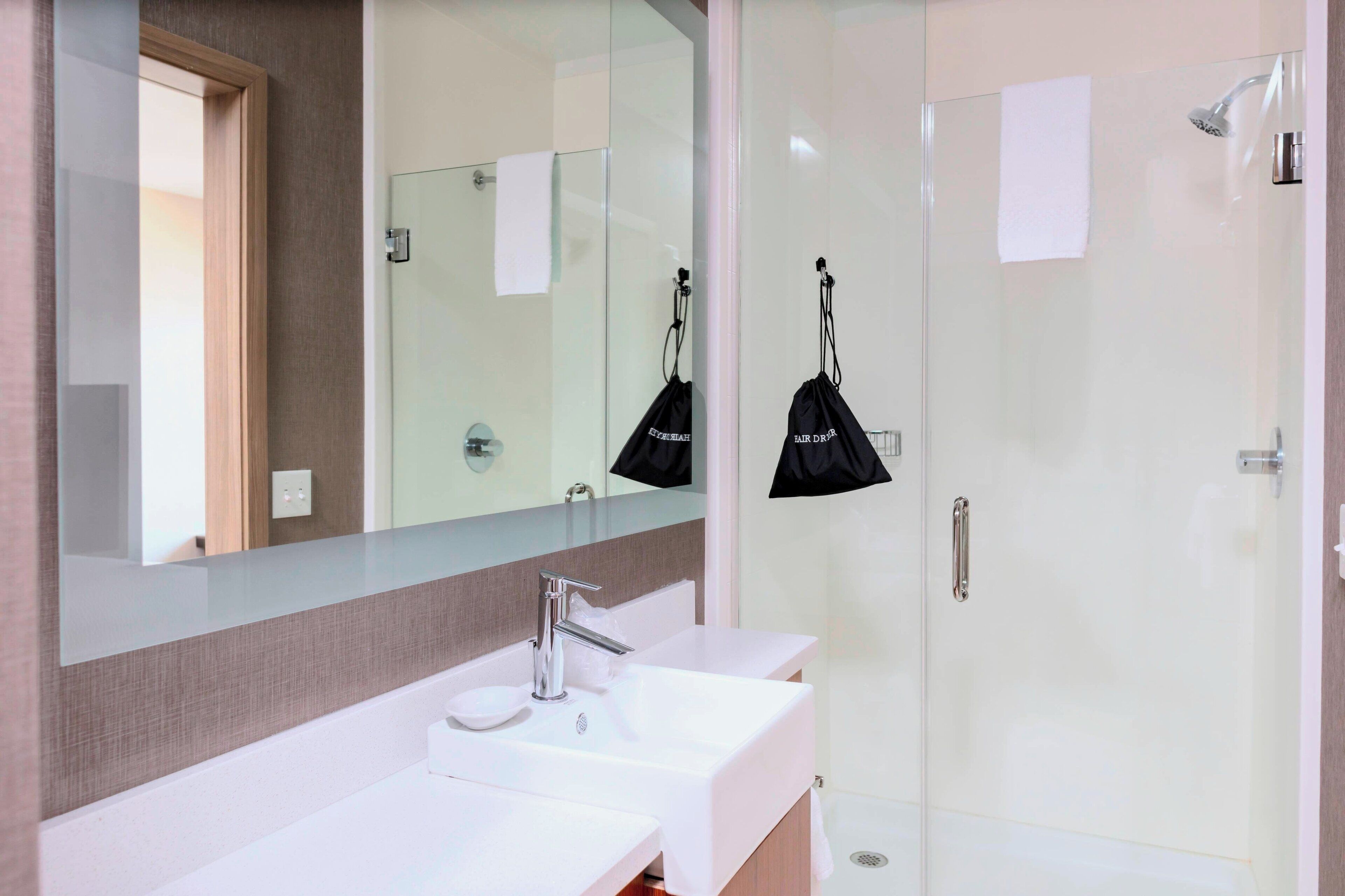 shower, free toiletries, hair dryer, towels