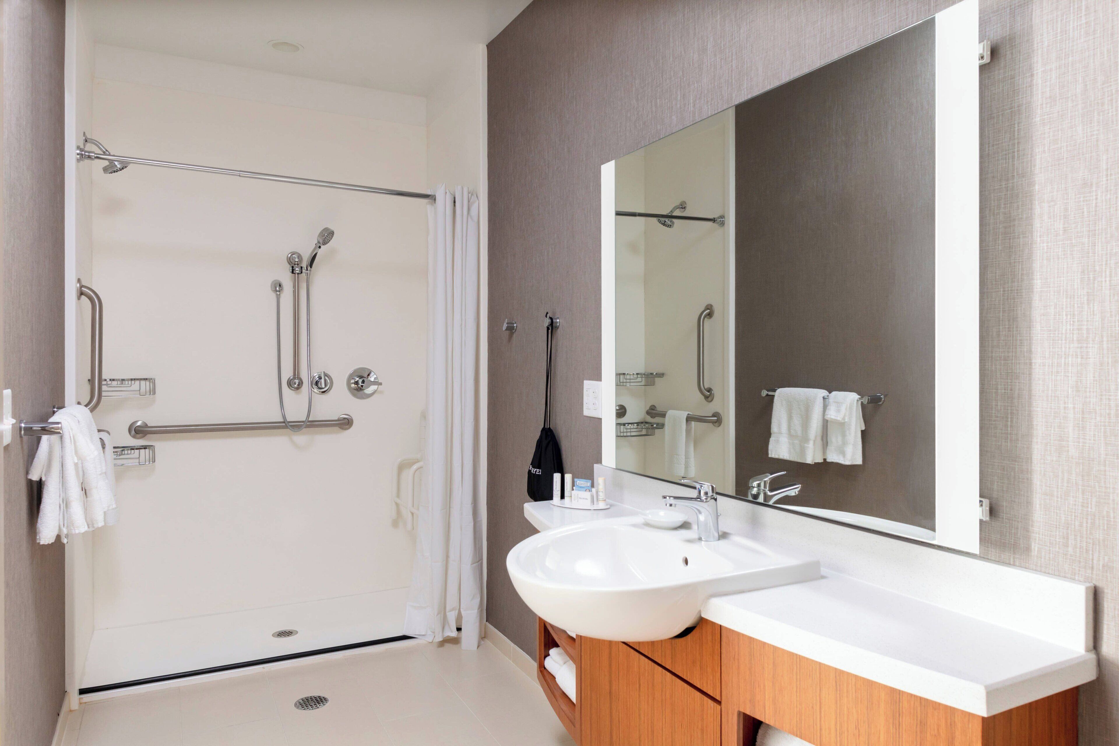 shower, free toiletries, hair dryer, towels