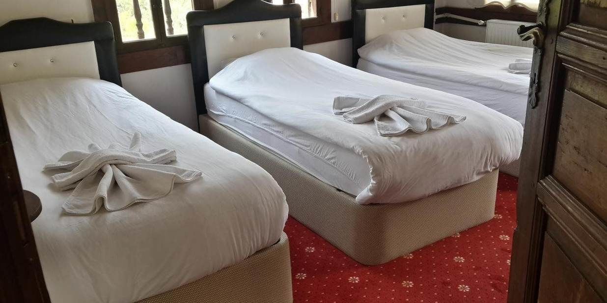 standard triple room | in-room safe, desk, iron/ironing board, free wifi