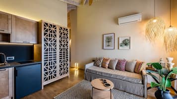 Suite, 1 Bedroom | In-room safe, soundproofing, iron/ironing board, free cots/infant beds