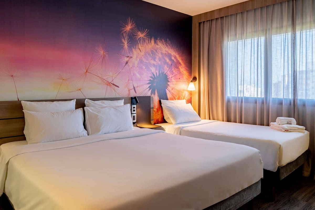 Superior Room, Multiple Beds | Down comforters, minibar, in-room safe, individually decorated