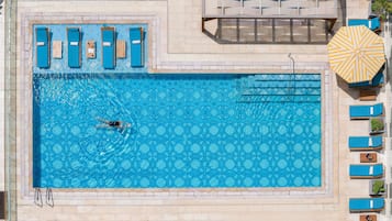 Outdoor pool, open 6:00 AM to 9:00 PM, pool umbrellas, sun loungers